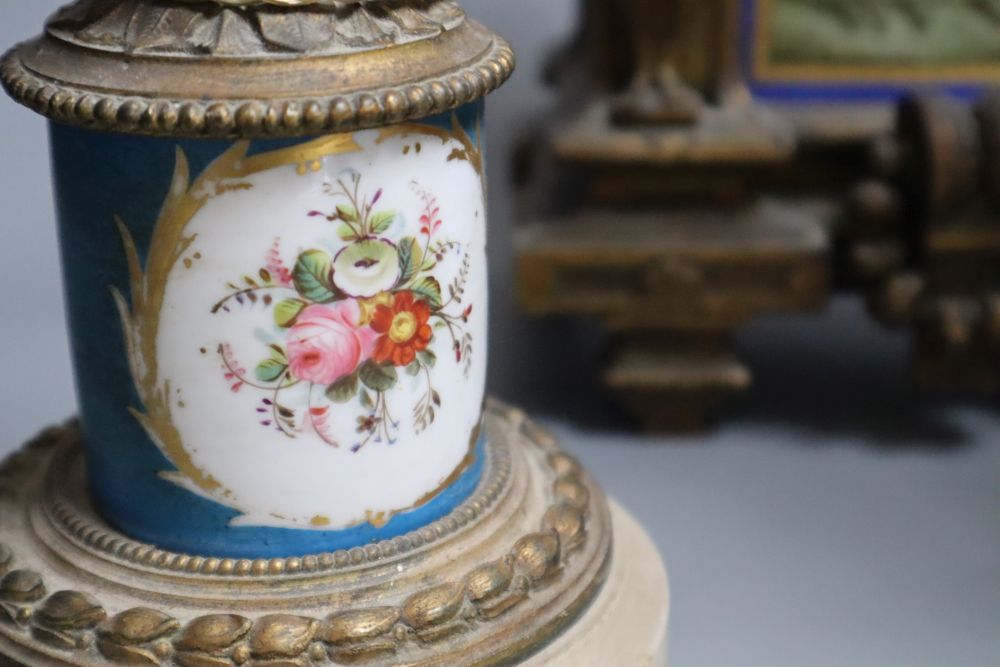 A 19th century French ormolu and Sèvres style porcelain matched garniture de cheminée
